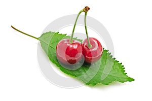 Cherries on leaf