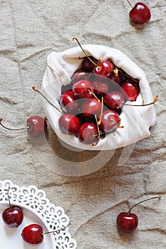 Cherries in linen bag, flat lay