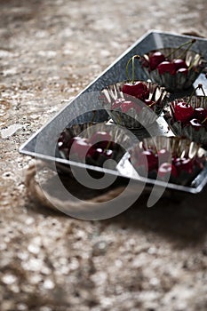 Cherries in a muffin tin