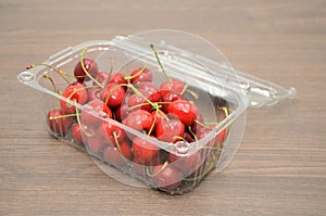Cherries in plastic packaging box