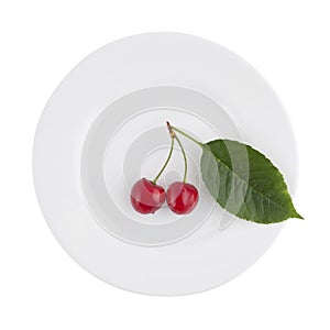 Cherries on a plate â€“ diet concept