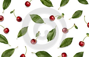 Cherries. Red ripe cherry berries and leaves on white background. Flat lay, top view