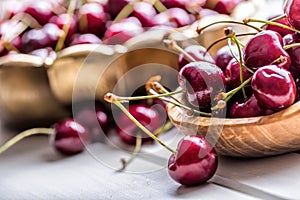 Cherries. Sweet Cherries. Fresh Cherries. Ripe cherries on wooden concrete table - board