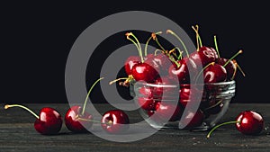Cherries or Sweet Cherry. Fresh juicy cherries in a glass bowl. Organic farm berries or fruits