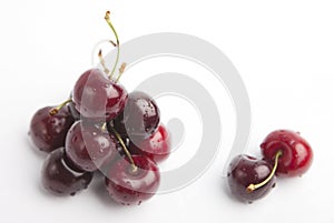 Cherries on white background