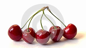 CHERRIES ON WHITE BACKGROUND