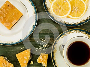 Cherry Bakewell Cake Slices With Black Lemon Tea