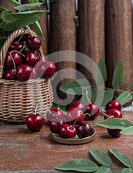 Cherry in basket, cherry harvest, red cherry on wooden background