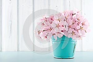 Cherry blossom flower bouquet on wooden background