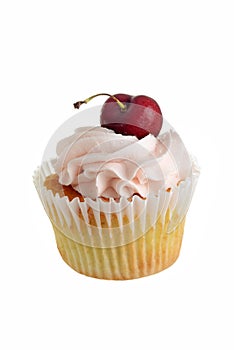 cherry buttercream cupcake with fruit on white