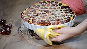 Cherry clafouti - traditional french sweet fruit dessert clafoutis with cherries.