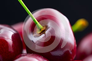 Cherry closeup. Organic ripe cherries isolated on black