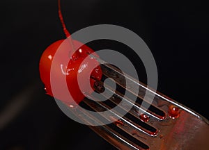 Cherry and fork photo