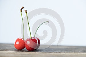 Cherry Fruits On Wooden Table Top