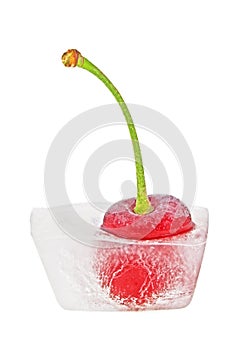 Cherry in ice cube over white background