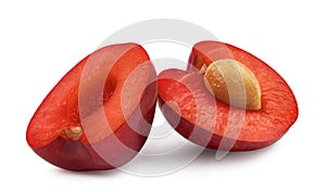 Cherry isolated. Two halves of sweet cherries on a white background. Fresh fruit berries.