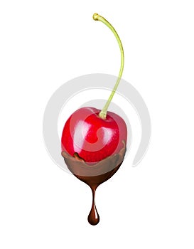 Cherry in liquid hot chocolate isolated on white background