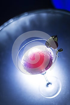 Cherry martini cocktail drink at night