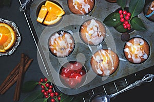 Cherry orange muffins in muffin baking pan