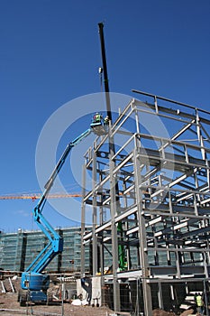 Cherry picker and metal frame photo