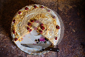 Cherry pie on the table with different vegetables