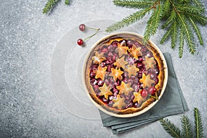 Cherry piecake with fresh cherry. Christmas decotation