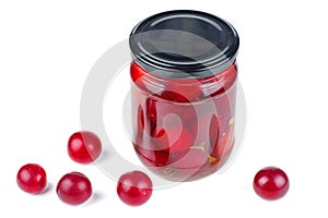 Cherry plums canned in glass jar isolated on white