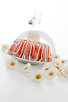 Cherry pudding cake and a jug of milk