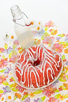 Cherry pudding cake and a jug of milk