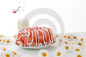 Cherry pudding cake and a jug of milk