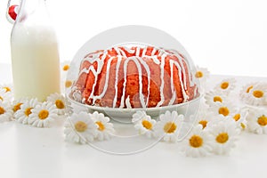 Cherry pudding cake and a jug of milk