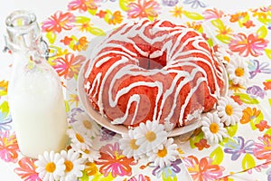 Cherry pudding cake and a jug of milk