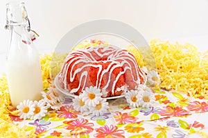 Cherry pudding cake and a jug of milk