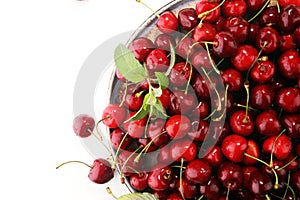 Cherry. Red fresh Cherries in bowl and a bunch of cherries on th