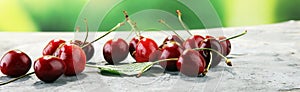 Cherry. Red fresh Cherries in bowl and a bunch of cherries on th