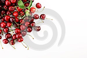 Cherry. Red fresh Cherries in bowl and a bunch of cherries on th