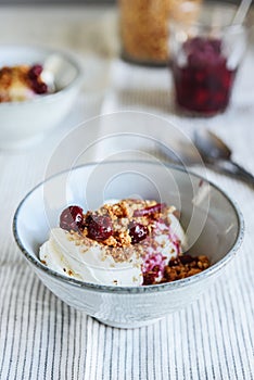 Cherry sauce, cream cheese and feta cream and crumble crust dessert