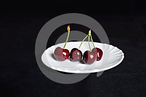 Cherry on a saucer