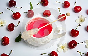 Cherry tea with fruits flat lay