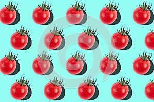 Cherry tomato pattern on light blue background