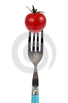 Cherry tomato stung on a fork