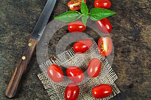Cherry tomatoes with basil leaf