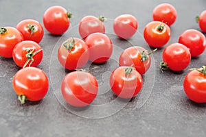 Cherry tomatoes on a black background