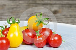 Cherry tomatoes on blue plate