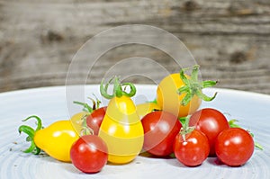Cherry tomatoes on blue plate