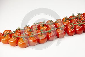 Cherry tomatoes on branch