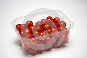 Cherry tomatoes in a clear plastic tray punnet