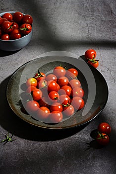 cherry tomatoes lite by window light