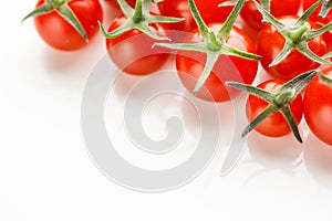 Cherry tomatoes part on white background