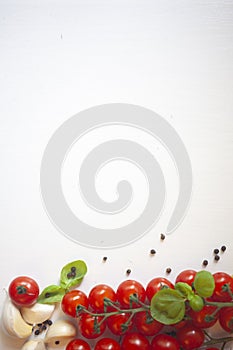 Cherry tomatoes, pasta, garlic and basil
